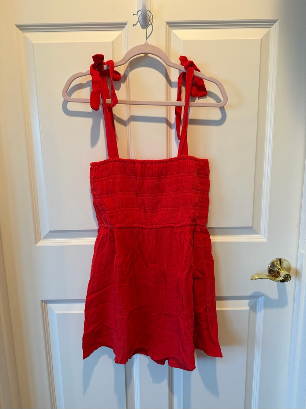 Needii Navy Smocked Tie-Strap Romper